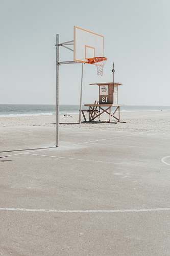 team white and orange basketball hoop sport